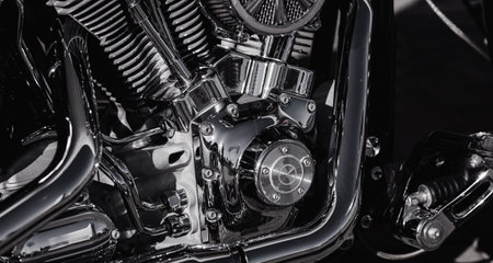 new motorcycle in shop. Motorcycles and accessories in custom store. chrome details engineの写真素材