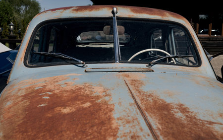 hood of a vintage rusty car. old-fashioned carの写真素材