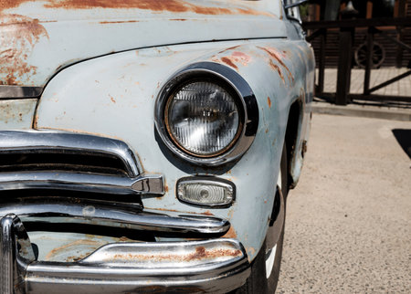 headlight of old retro car. vintage rusty auto. vintage transportの写真素材