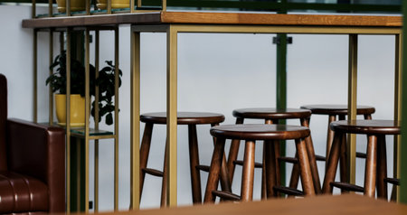 Row of wooden chairs or stools vintage in bar interior retro style decorationの写真素材