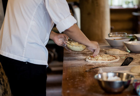 chef prepares a traditional Italian pizza margarita. selective focusの写真素材