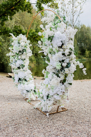 beautiful round wedding arch with flowers. Wedding decorationsの写真素材