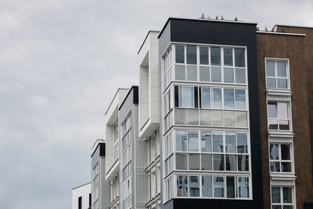 Modern apartment building with new apartments in a green residential area.の写真素材