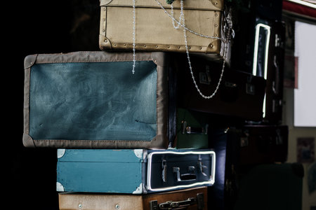 Pile of old vintage suitcases decorations. Retro baggageの写真素材