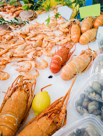 Fresh seafood on ice for sale at the market in Parisの写真素材