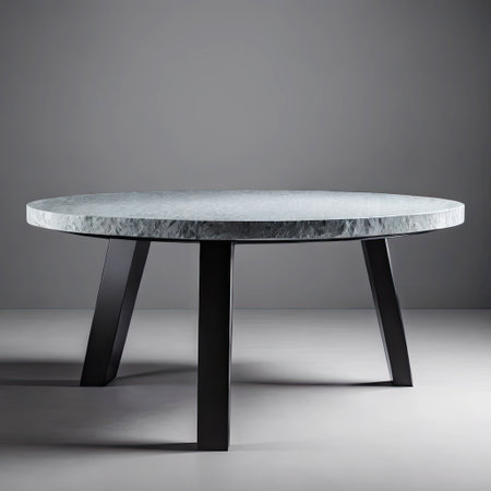 luxury stone table with stone top and black legs on the backgroundの素材