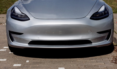 Gray electric car. front view. zero carbon dioxide emissionsの写真素材