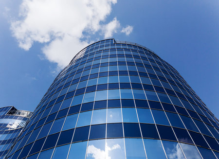 blue glass skyscraper. modern architectural design.