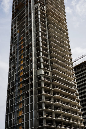 high building under construction. Abstract modern concrete architectureの写真素材