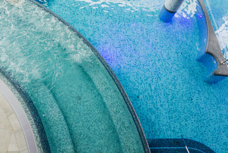 Swimming pool top view. Surface of clear swimming pool.