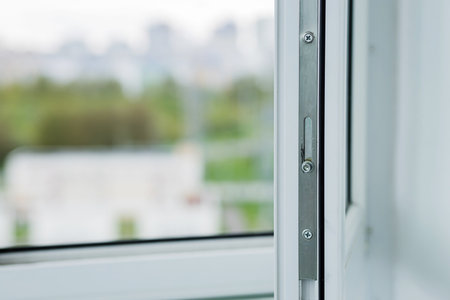 Metallic window lock mechanism. modern security detailの写真素材