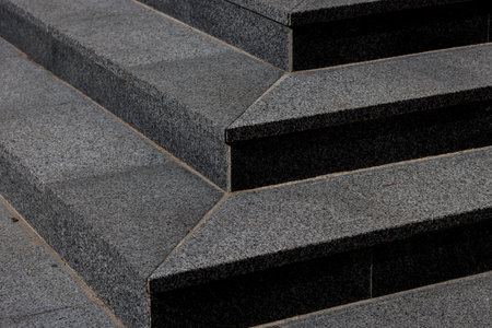 Outdoor concrete stairs covered granite tiles. Step of exterior stairway.の写真素材