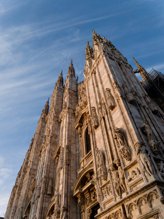 Main facade of the famous Duomo cathedral in Milan city in Italyの写真素材