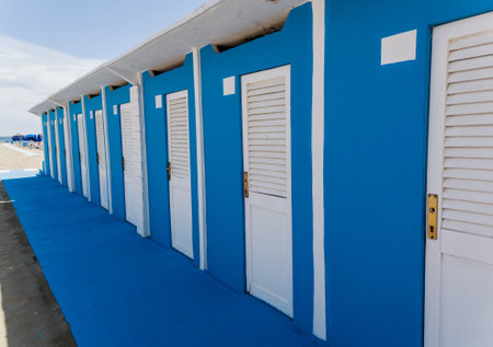 Row of beach huts of white and blue colors. no peopleの写真素材