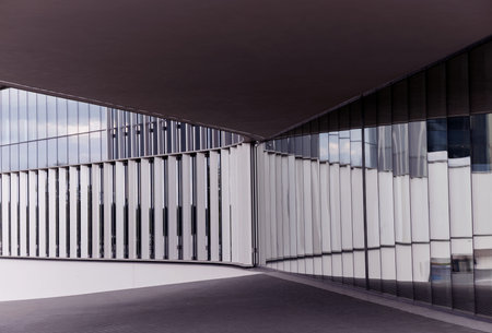 Abstract steel and glass facade detail background of commercial building. Business architecture