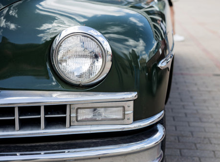 Round headlight vintage car. old-fashioned retro auto