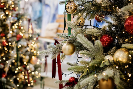 Christmas tree branch decorated with balls and decorの写真素材