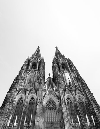 Black and white facade of the gothic cathedral in Cologneの写真素材