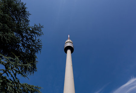 Horizontal shot of the Dortmund television tower over blue sky backgroundの写真素材