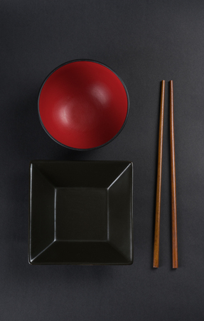 A top view of an arrangement of Chinese dishes/plates and chopsticks.の写真素材