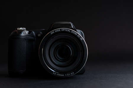 Photo camera in dark backgrond, detailの写真素材