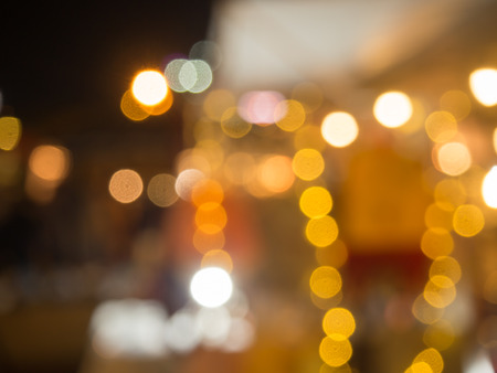 abstract bokeh blur background in orange toneの写真素材