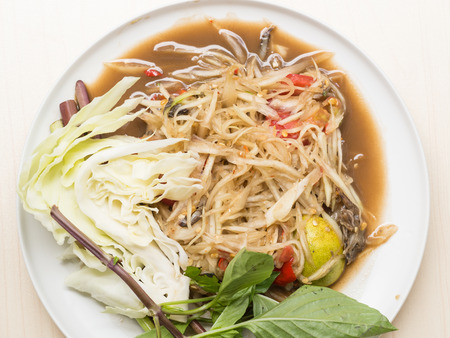 Spicy papaya salad, popular dish in Thailandの写真素材