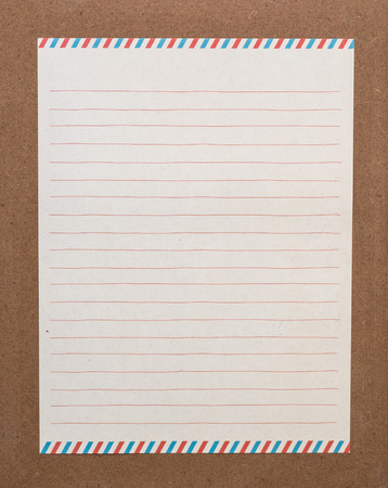 A lined letter paper on the boardの写真素材
