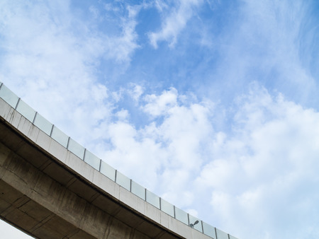 Under expressway with clear blue skyの写真素材