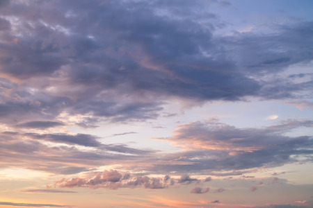 Dramatic orange grey purple sky and cloudy at sunset for background