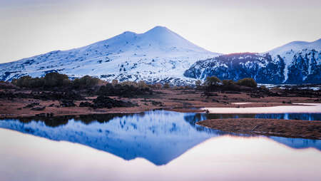 Llaima Volcano and geen lakeの写真素材