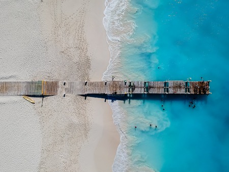 Drone photo of pier in beach in Grace Bay, Providenciales, Turks and Caicosの写真素材