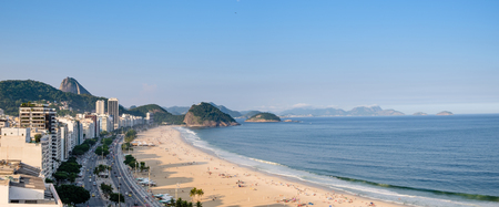 view of Copacabana beach right side during early morning, taken from the rooftop of a hotel, some slight fog can be seen on the blue sky. Rio de Janeiro, Brazil.の写真素材