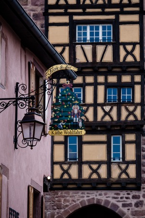 Riquewihr, France - April 27, 2017 : Ornate sign of shop in the touristic region of Alsace .のeditorial素材