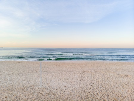 low Drone photo Barra da Tijuca beach during sunrise, sand still in shade.の写真素材