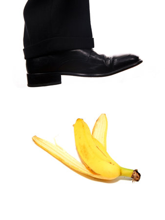 businessman shoe steping a bananaの写真素材