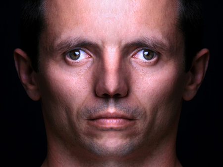 monster head portrait against black backgroundの写真素材