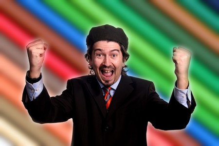 young business man playing silly over white backgroundの写真素材