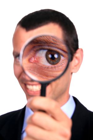 businessman with magnifying glass, isolated on whiteの写真素材