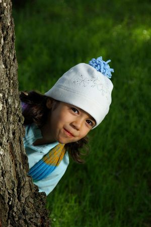 Cute girl in autumn parkの写真素材