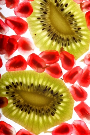 beautiful and fresh pomegranate grains and kiwiの写真素材
