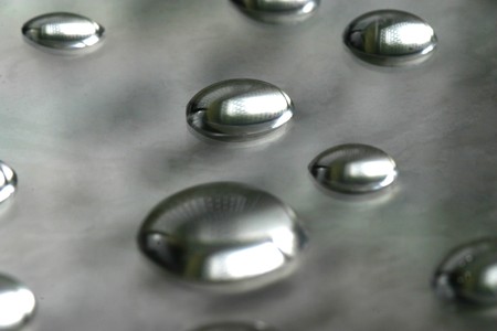 Drops of water on a compact disk, technologyの写真素材