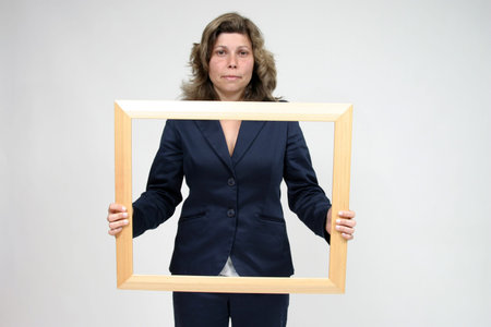 Portrait of a beautiful young woman with frame