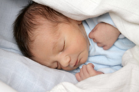 sweet baby sleeping on a blanket, newborn baby