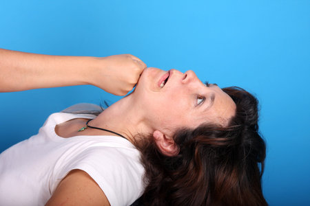 woman having punch, fight scene, studio photo