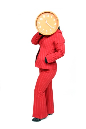 sexy businesswoman with clock, business photoの写真素材