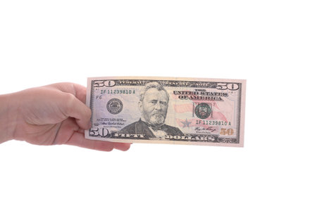 hand holding a dollar bill, business studio photo