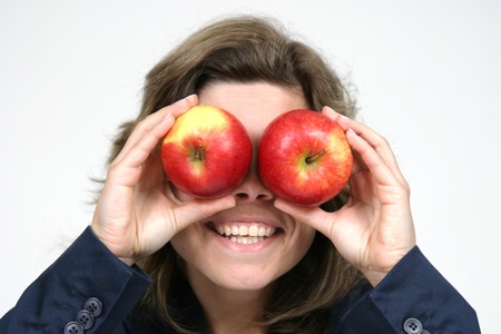 woman with beautiful red apple, healthy foodの写真素材