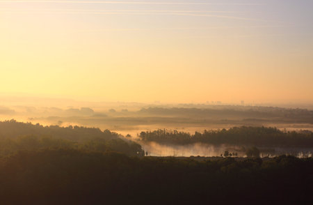 daybreak in the mist of the valley of the Seineの写真素材