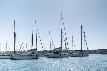sailing boats moored to buoys in the port of Erquy in Brittany